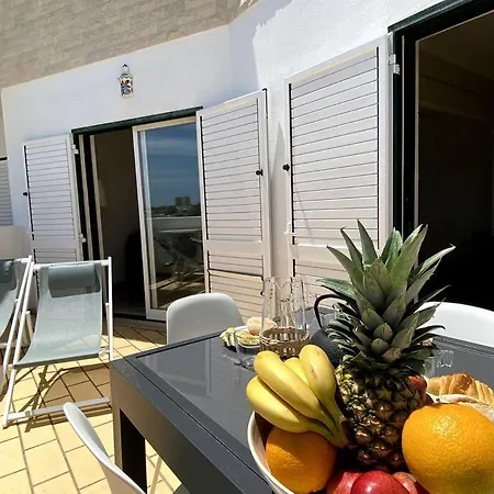 By Coral Apartment *