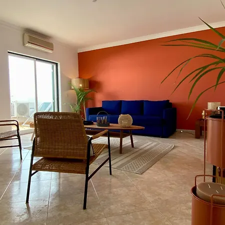 By Coral Apartment *